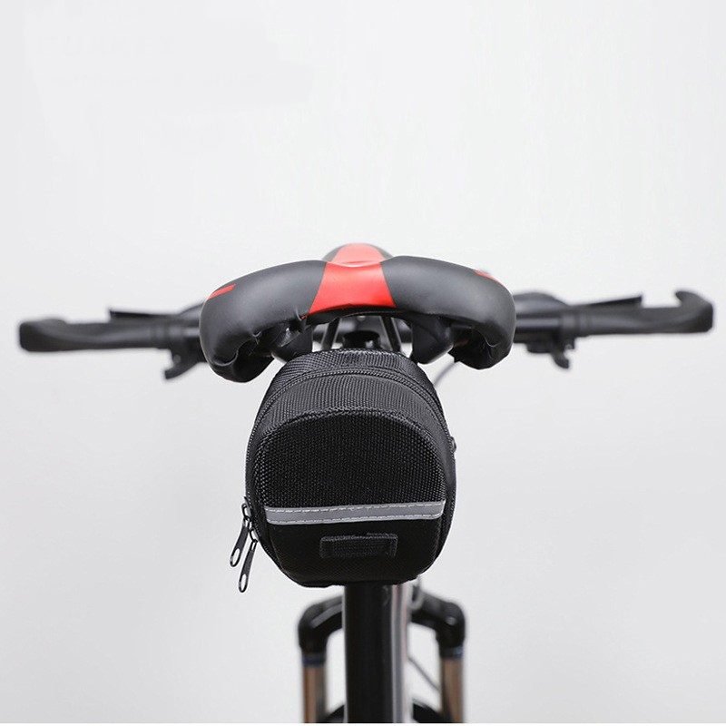 Black Water Resistant Bicycle Saddle Bag Under Seat Wedge Pack with Reflective Strip and Quick Release Strap for MTB Road Bikes 2 Black Water Resistant Bicycle Saddle Bag Under Seat Wedge Pack with Reflective Strip and Quick Release Strap for MTB Road Bikes - image 2